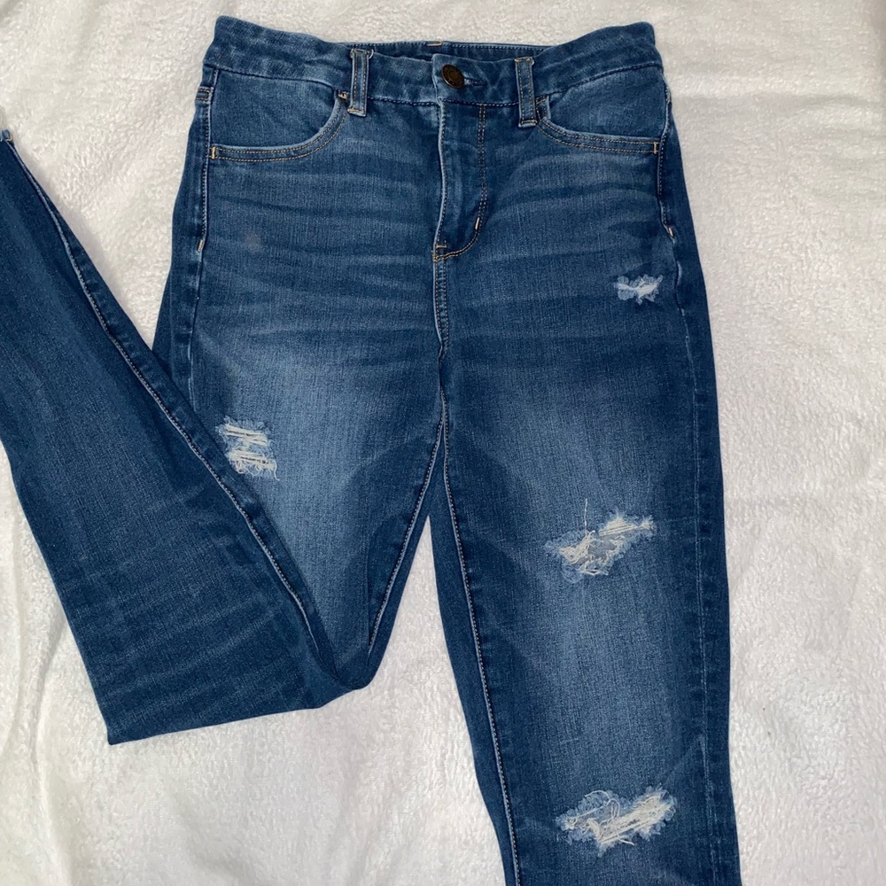 Size four ripped jeans